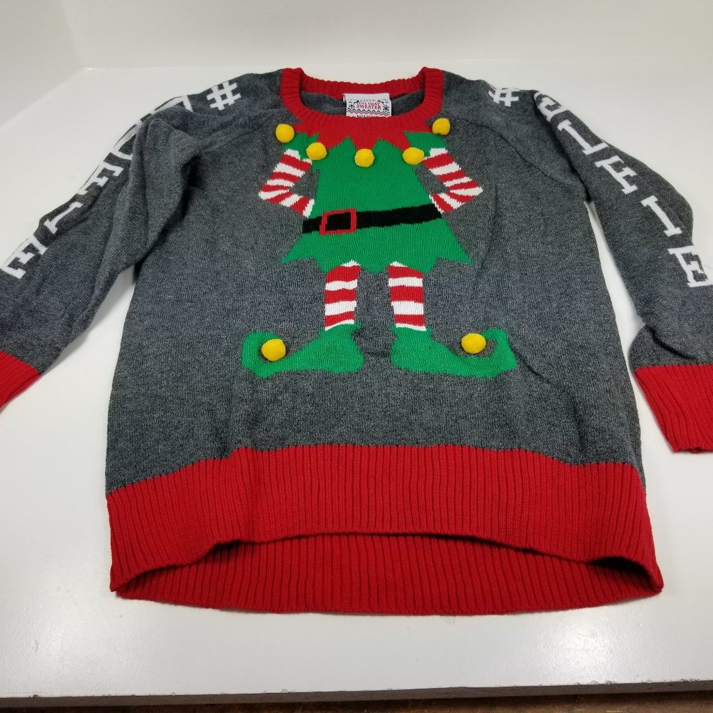 Elfie sweater with pom pom trim on neck and shoes